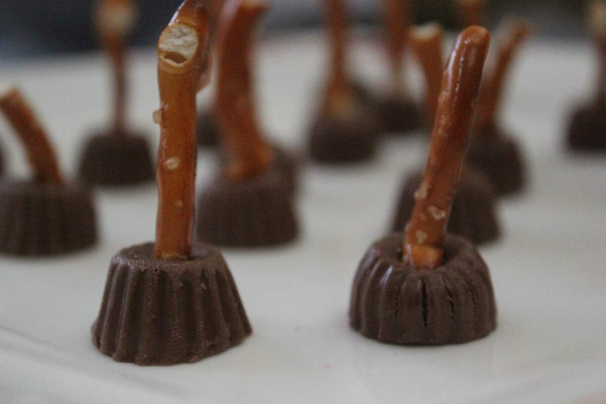 Witch Broomsticks made of candy and pretzels.