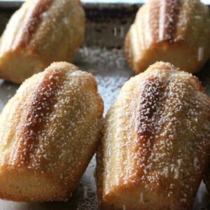 Batch of madeleines on a tray.