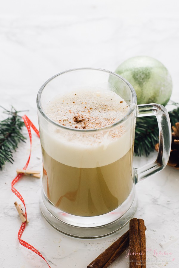 Spiced eggnog in a glass mug.