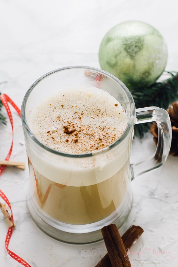 This Boozy Christmas Spiced Eggnog in a glass mug.