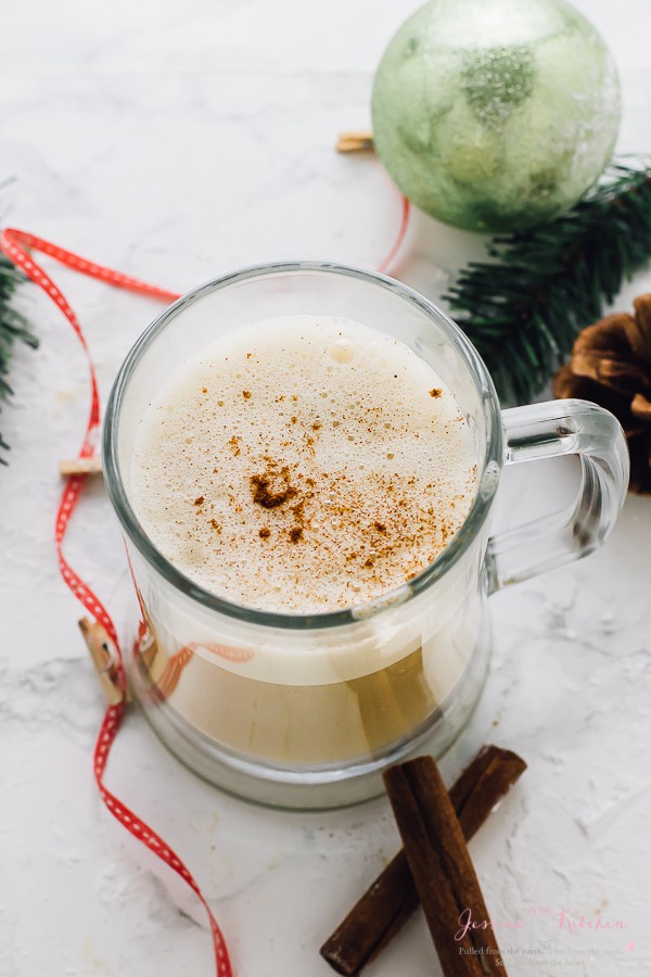 Top down shot of Boozy Christmas Spiced Eggnog in a glass mug.