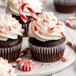 Chocolate peppermint swirl cupcakes with candy canes.