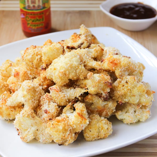 A white plate full of cauliflower wings.