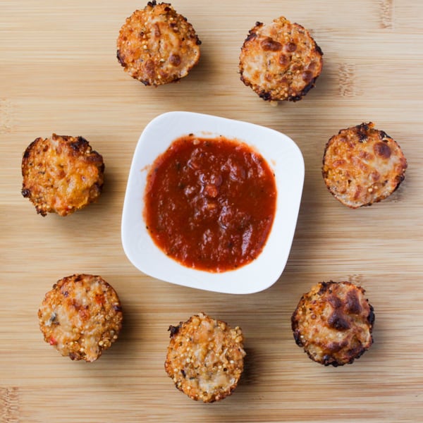 Top down shot of pizza bites with dip.