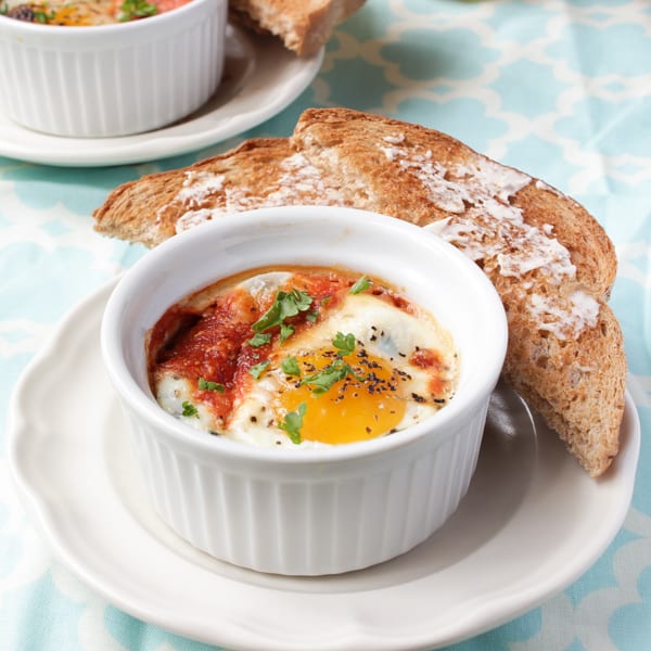 Baked eggs in a ramikin with toast.