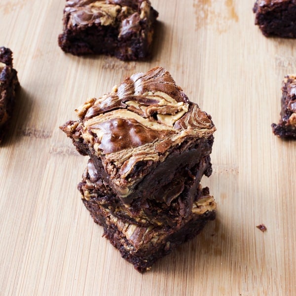 Peanut butter brownies on a wooden table.