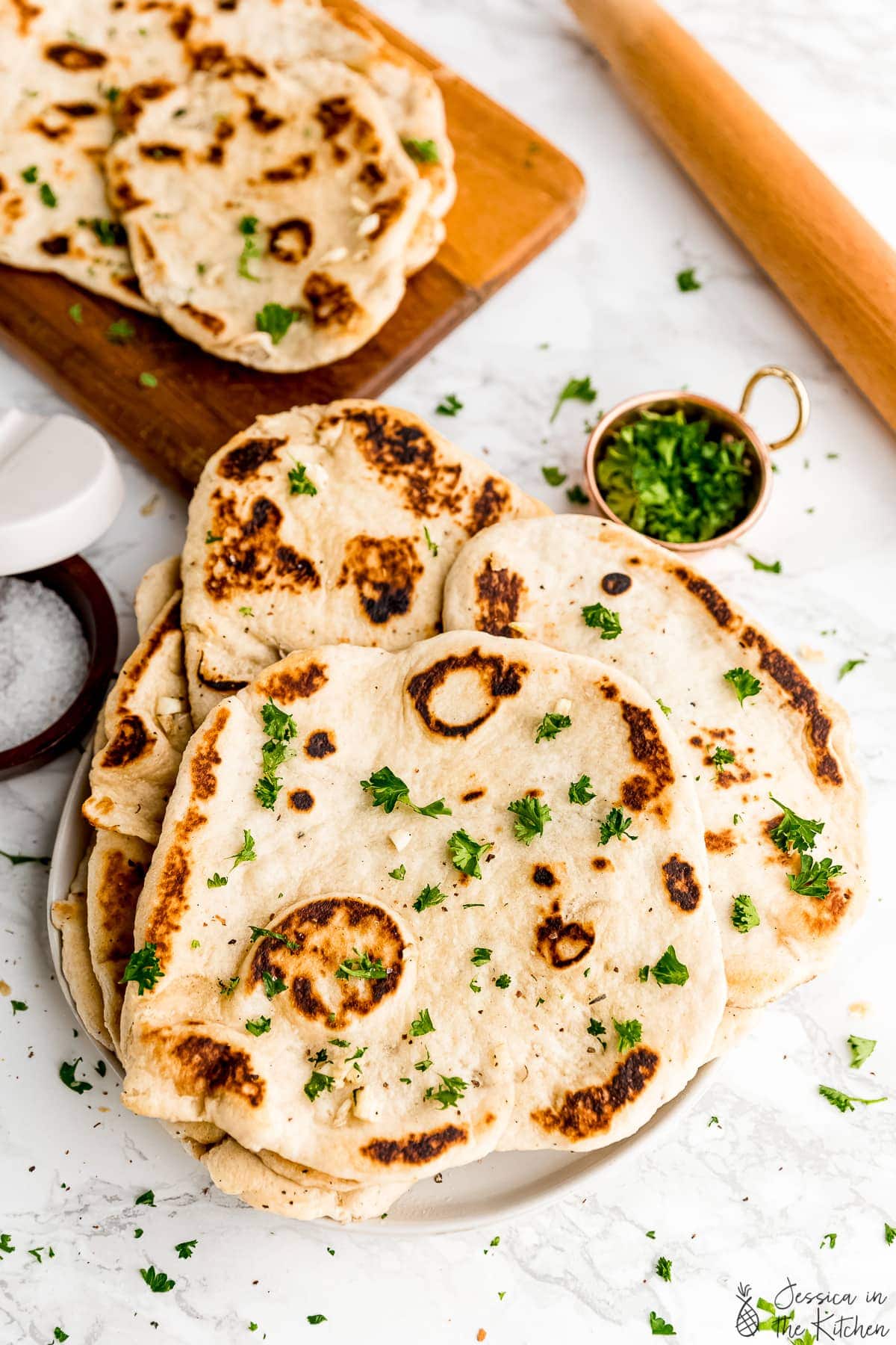 Plate of vegan naan loaves.