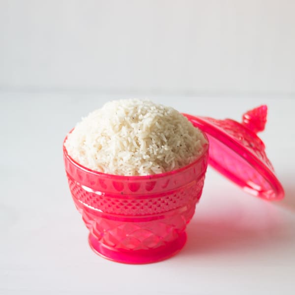 Pink bowl with white rice.