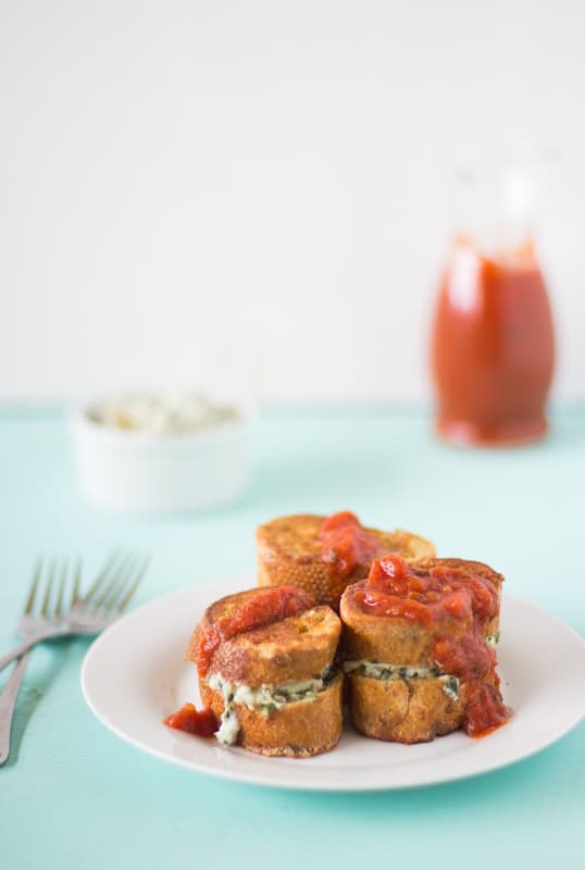 Italian Style Stuffed French Toast on a white dish.