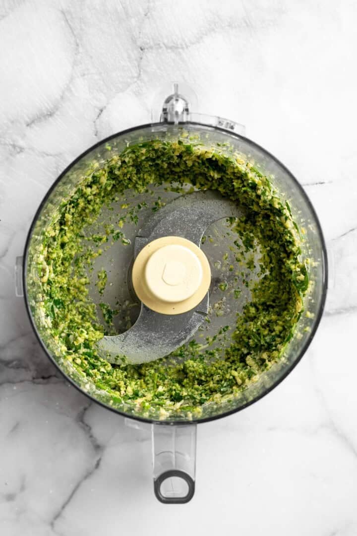 Parsley pesto in food processor before adding oil.