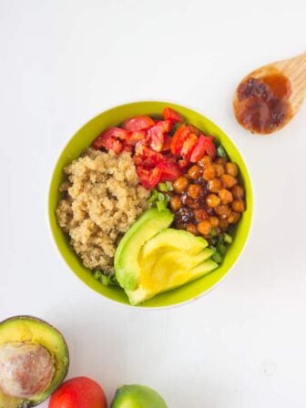 Overhead shot of salad bowl in a green bowl.