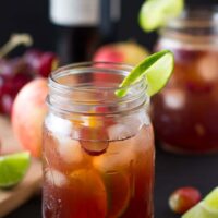 Side on shot of sangria in a mason jar.