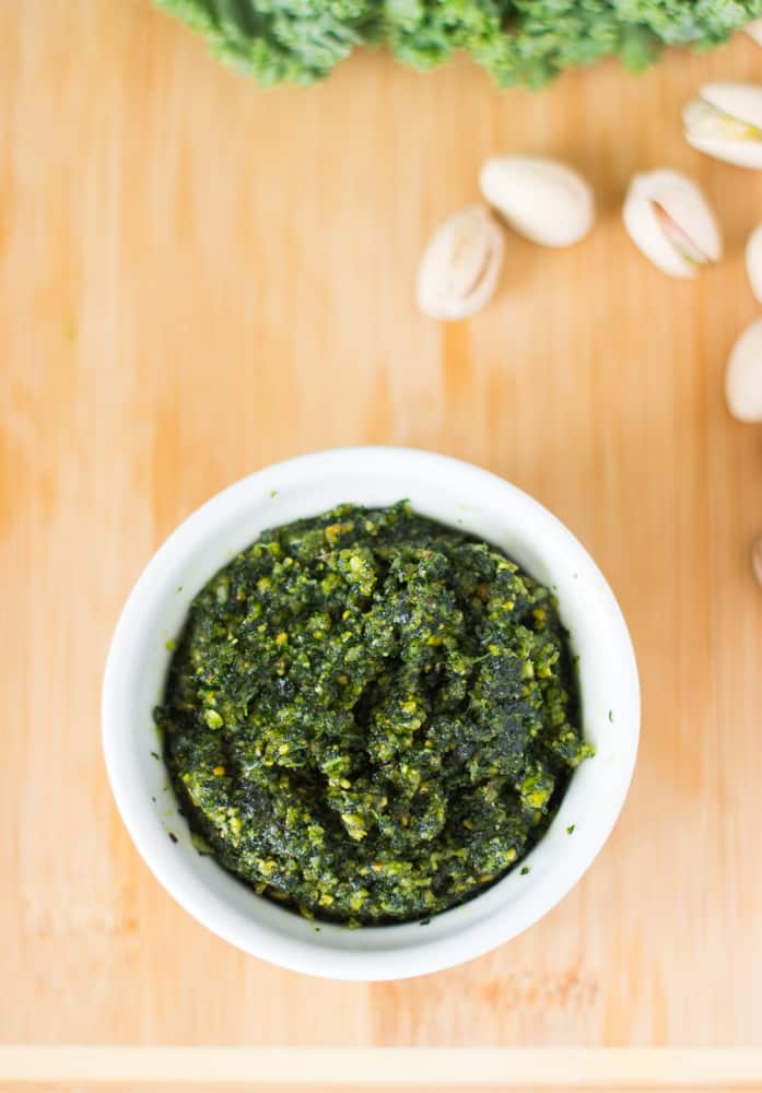 Top down shot of pesto in a ramekin. 