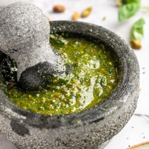 Mortar and pestle with pistachio pesto