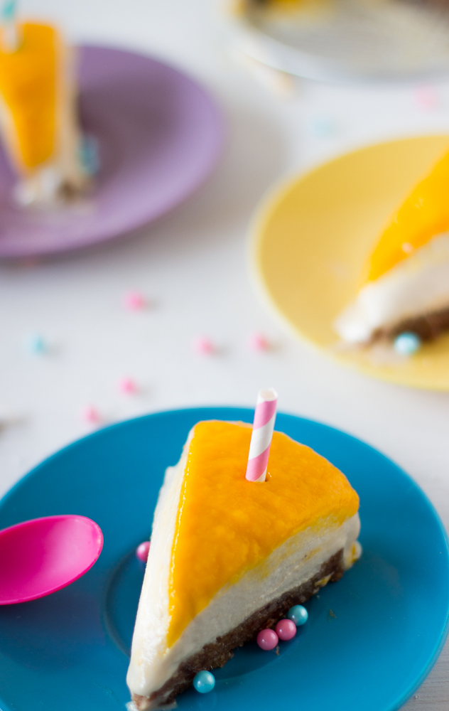 Overhead shot of cheesecake with a straw on it. 