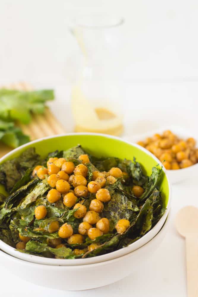 Green bowl full of Crunchy Kale & Chickpea Salad.