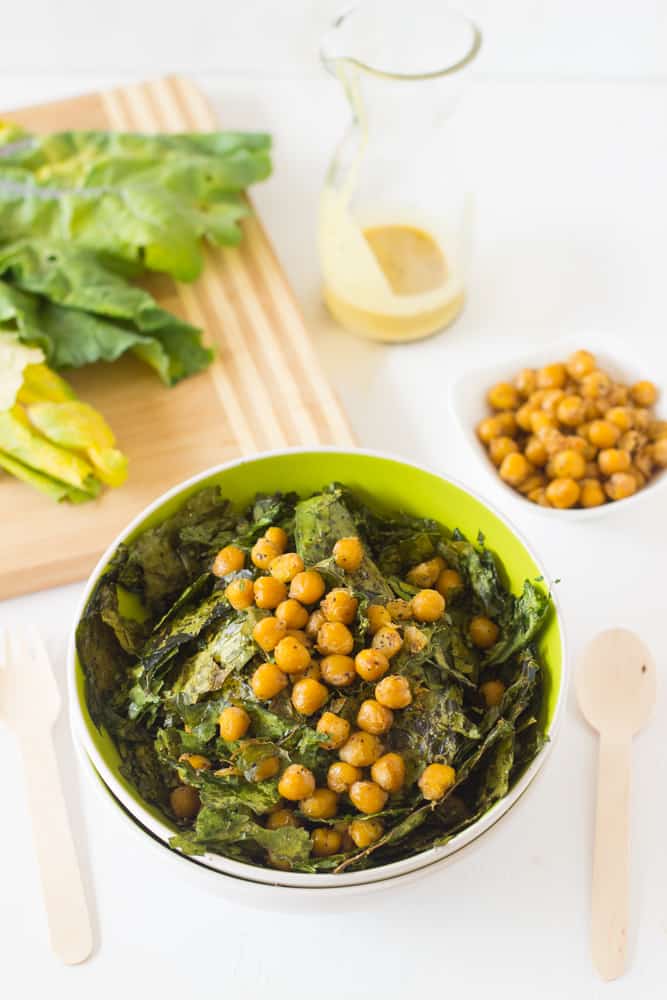 Chickpea salad in a green bowl.