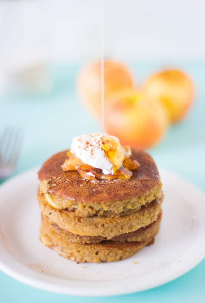 A stack of flourless apple pie pancakes on a white dish.