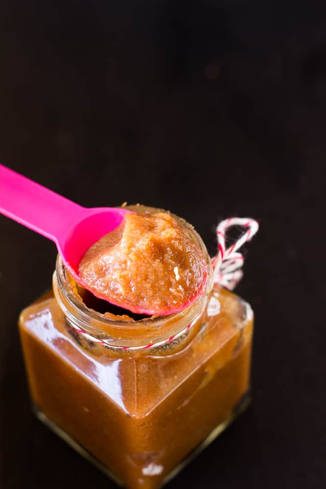 A pink spoon with date syrup.