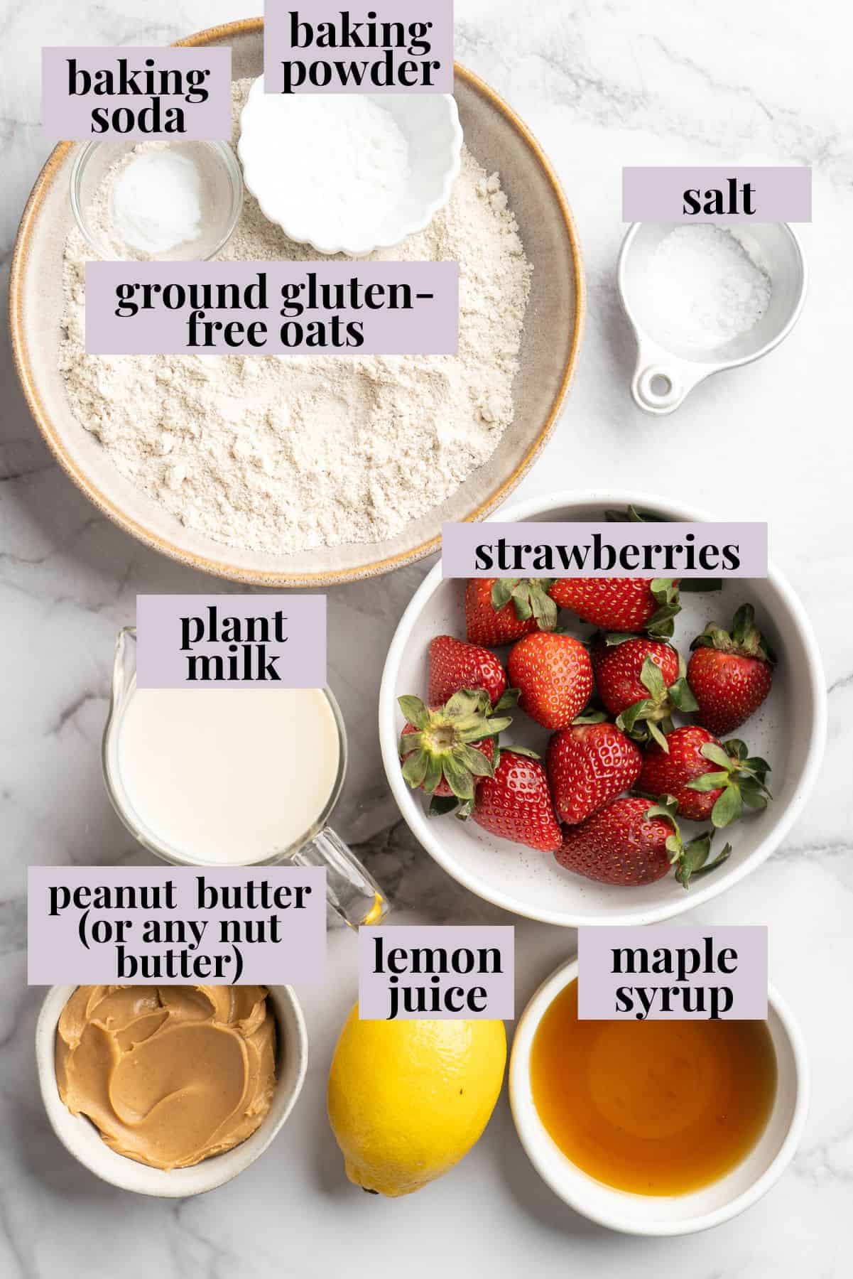 Overhead view of ingredients for peanut butter and strawberry jelly waffles