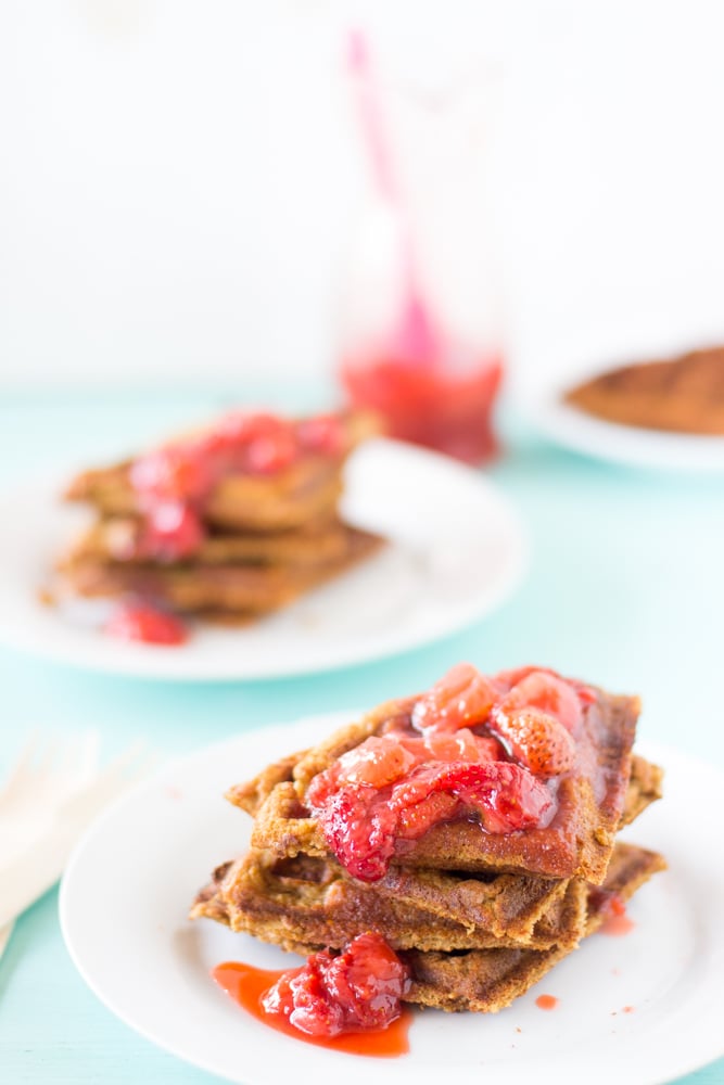 Three peanut butter waffles stacked on top of each other.