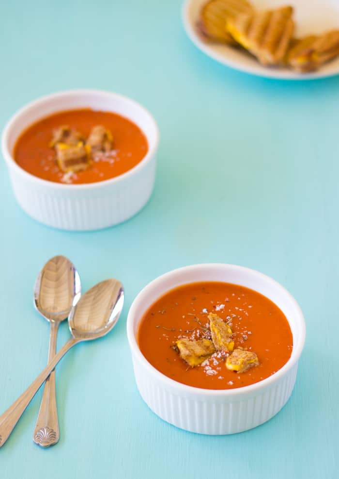 Roasted Tomato Soup in two white ramekins, 