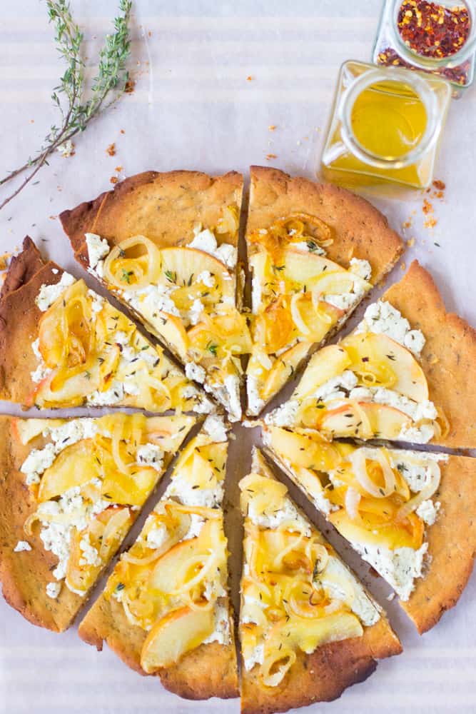 https://jessicainthekitchen.com/wp-content/uploads/2014/09/This-Caramelised-Onions-Apples-and-Goat-Cheese-Pizza-is-sprinkled-with-thyme-drizzled-with-honey-and-incredibly-tasty-glutenfree-fall-apple-pizza-3.jpg