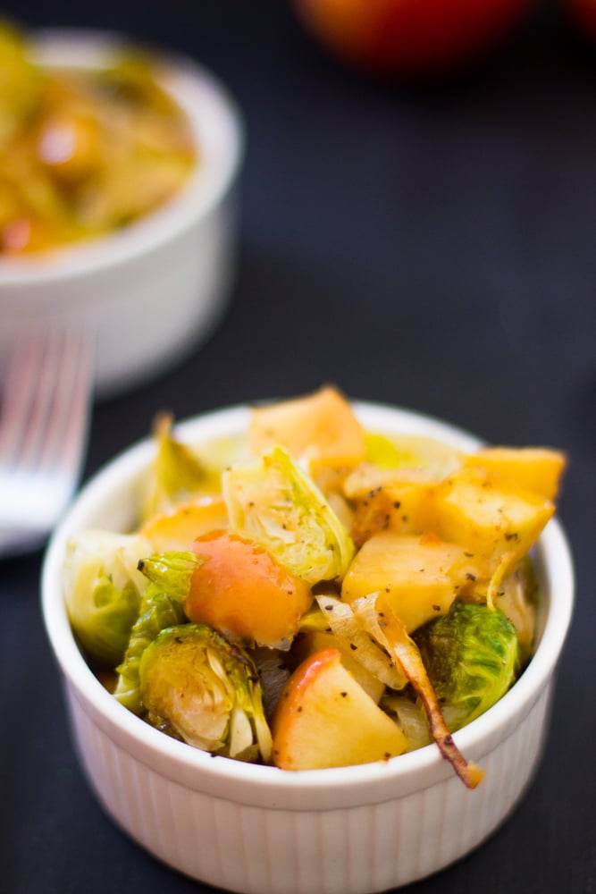 Maple roasted brussels sprouts in a white ramekin. 