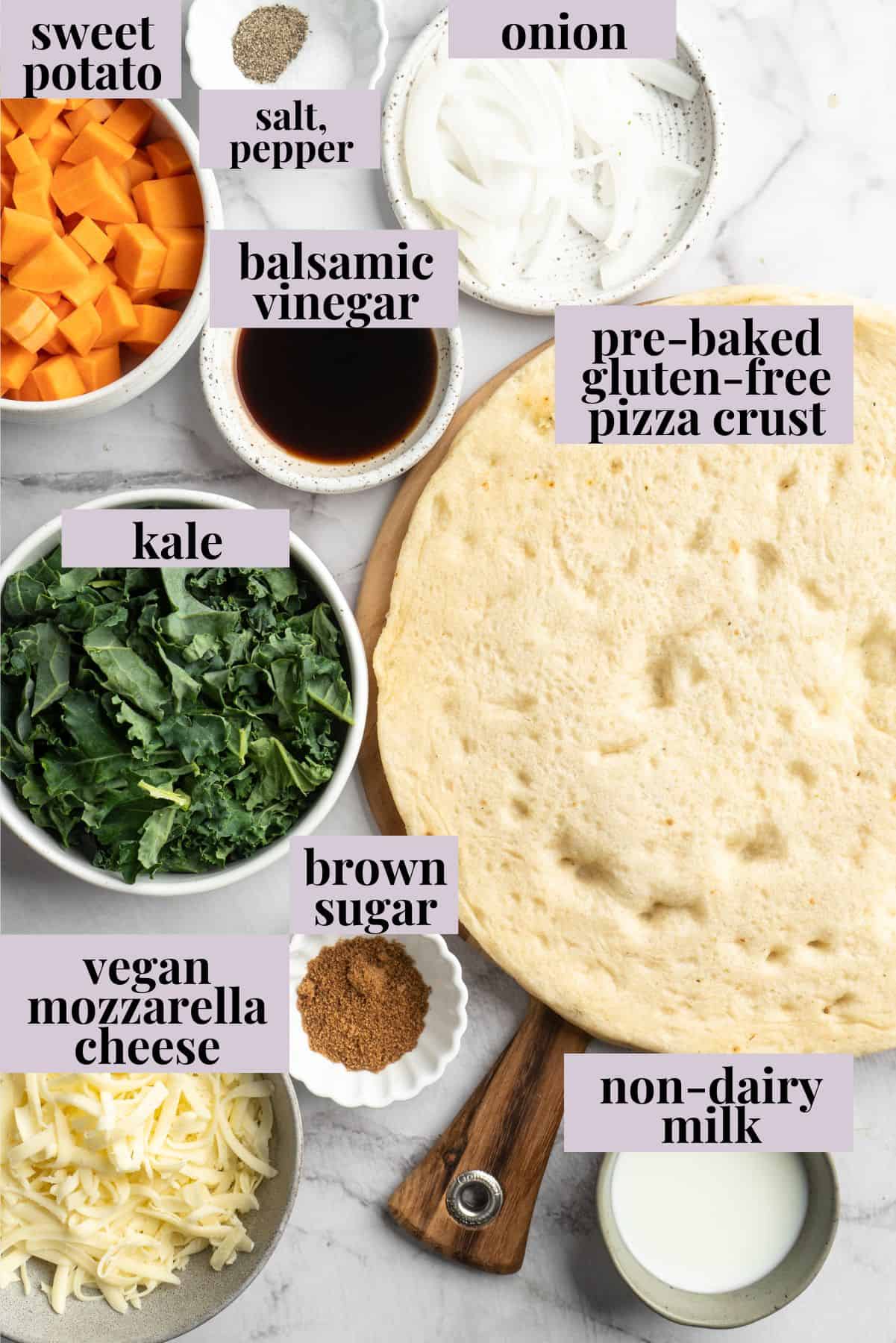 Overhead view of ingredients for sweet potato and kale pizza