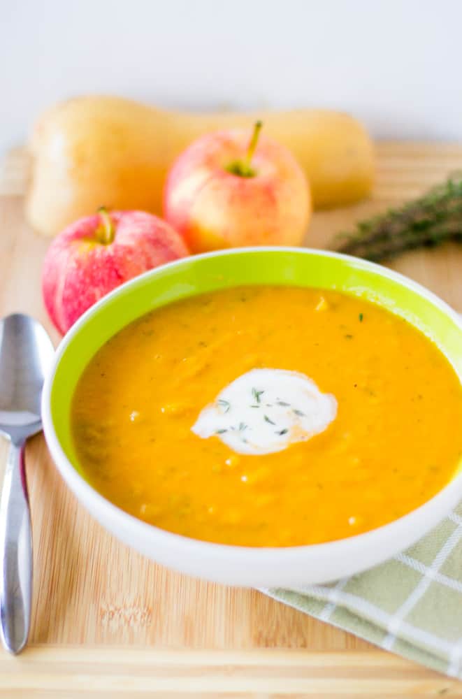 Vegan Butternut Squash and Apple Soup in a white bowl.