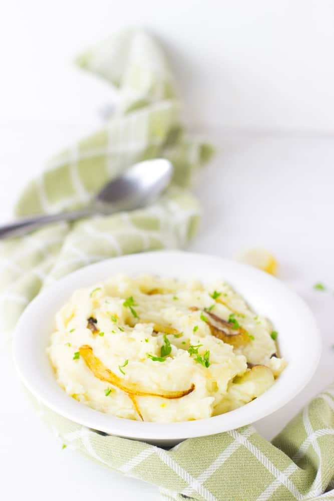 Garlic Mashed Potatoes in a white bowl.