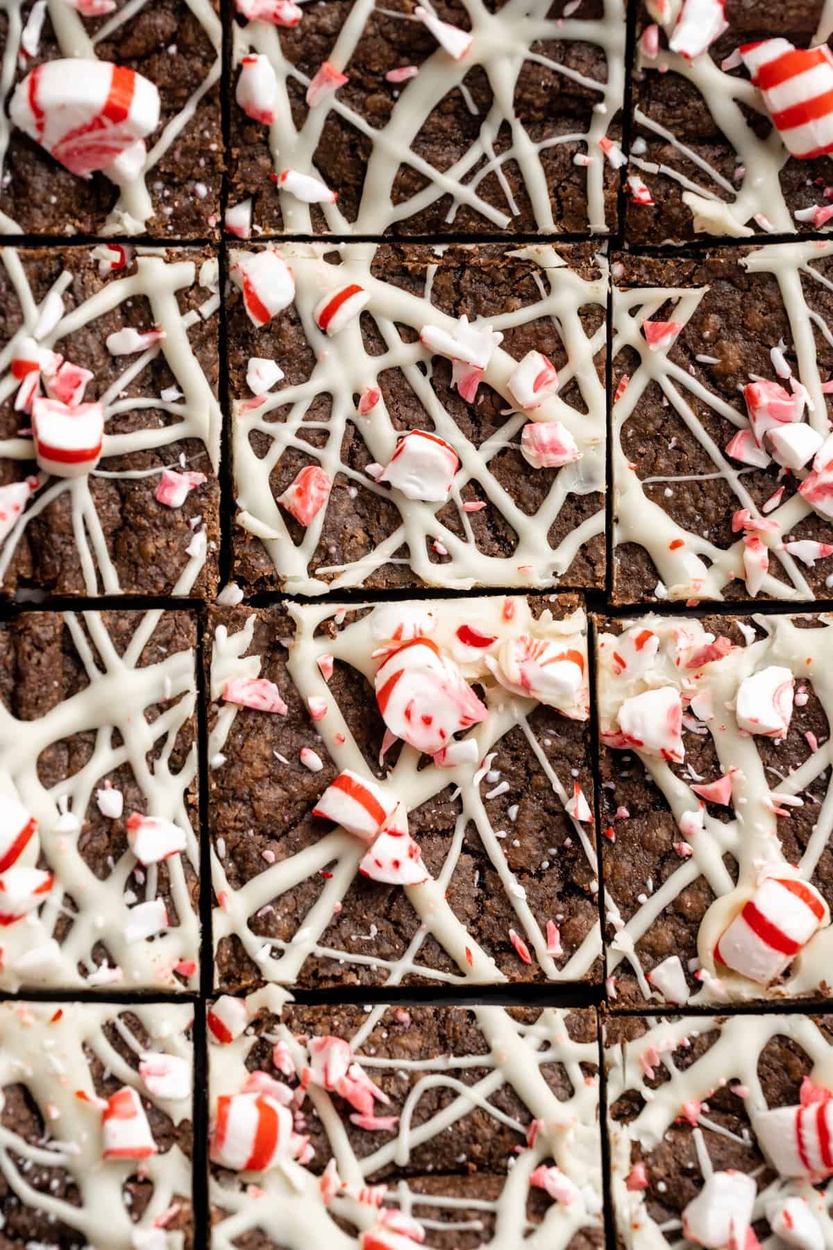 Sliced peppermint chocolate brownies topped with white chocolate.