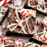 Peppermint brownies topped with white chocolate and candy canes.