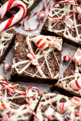Peppermint brownies topped with white chocolate and candy canes.