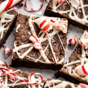 Peppermint brownies topped with white chocolate and candy canes.