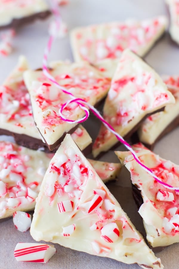 A batch of white chocolate peppermint bark on parchment paper.