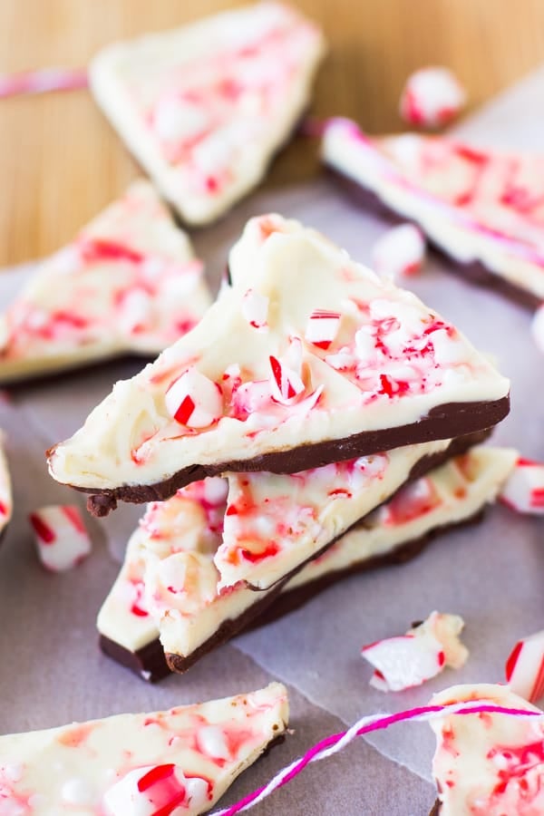 A stack of white chocolate peppermint bark on parchment.