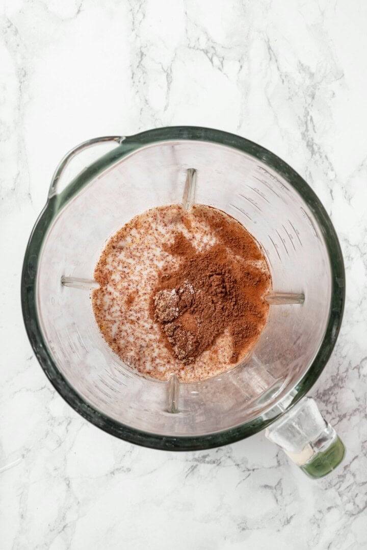 Ingredients for cashew custard in blender.