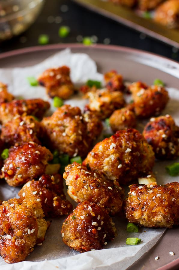 These Sticky Spicy Sesame Cauliflower Wings are the best veggie wings I've ever had! Loaded with a maple sesame flavor and spice, they are the perfect game day snack for vegans!