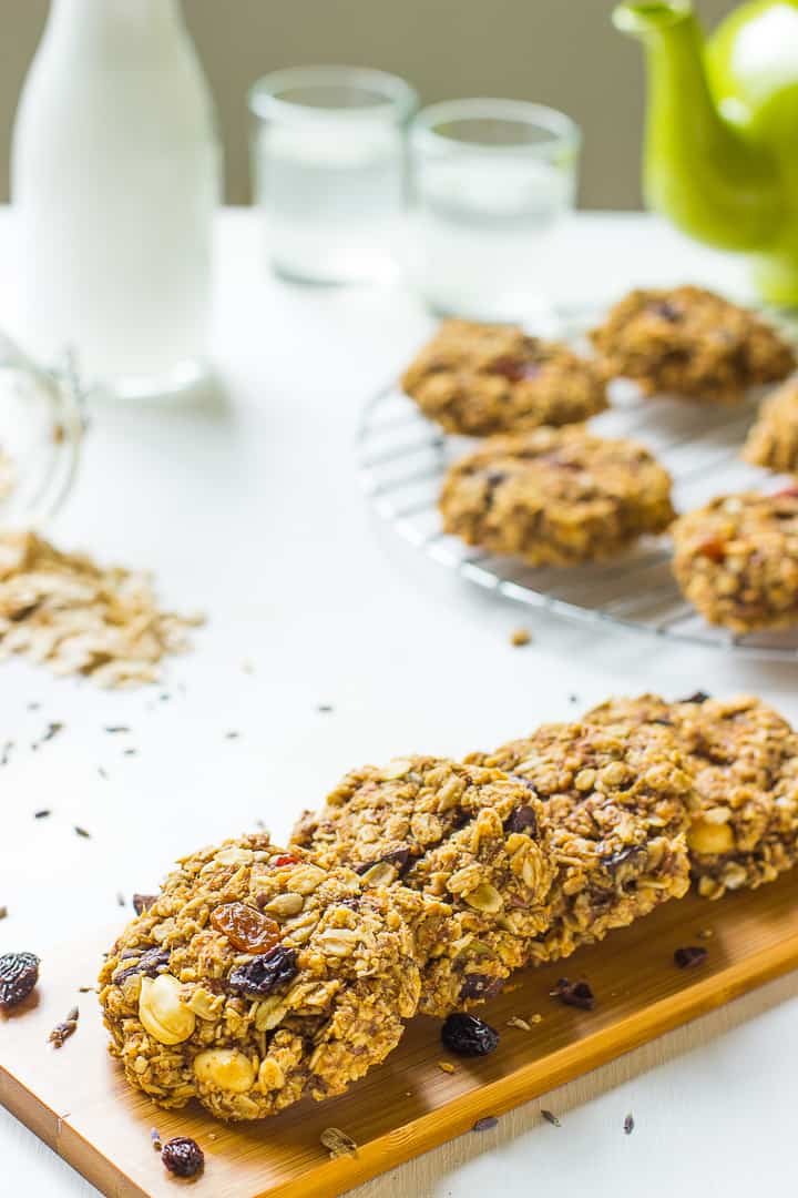 A row of breakfast cookies on a wooden board. 