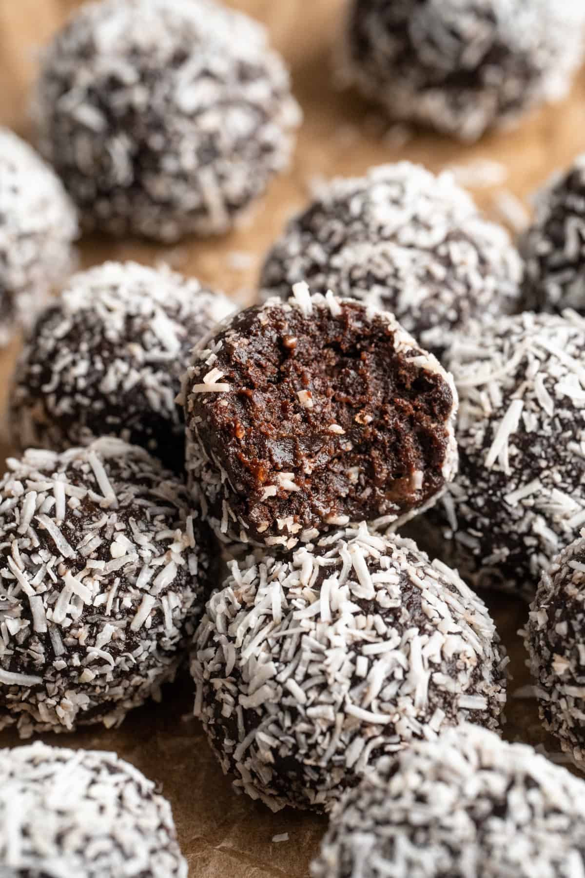 Bitten no bake brownie energy bite set, showing fudgy texture.