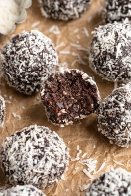 No bake brownie energy bites with bite taken out of one in the center.