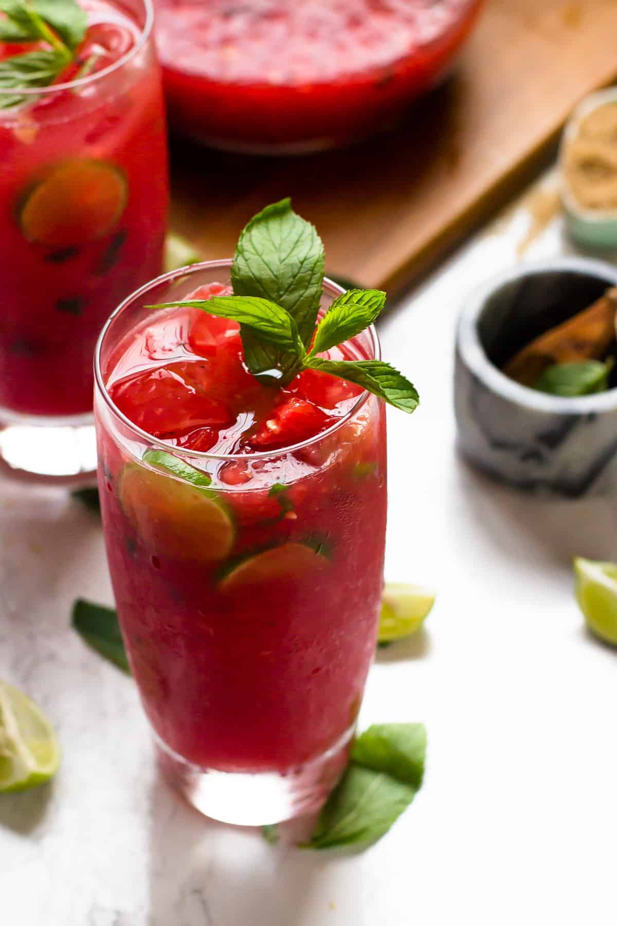 Two glasses of watermelon mojitos.