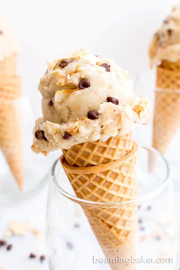 Toasted coconut chocolate chip nice cream in a cone.