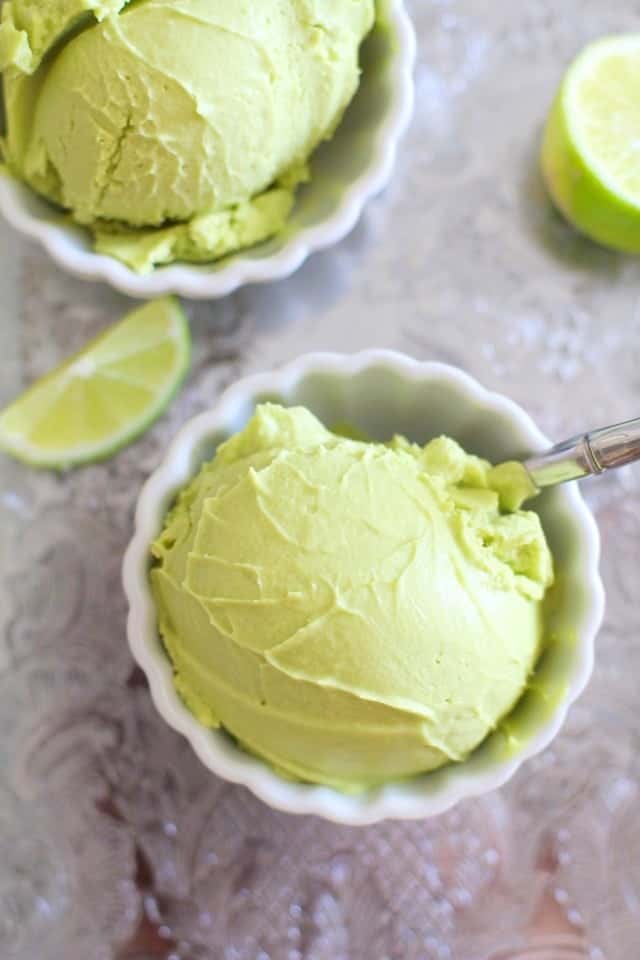 Top down shot of vegan key lime ice cream in white bowls. 