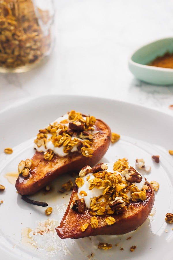  Two cinnamon baked pears with a crunchy topping.