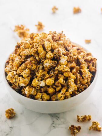 A bowl full of vegan salted caramel popcorn.