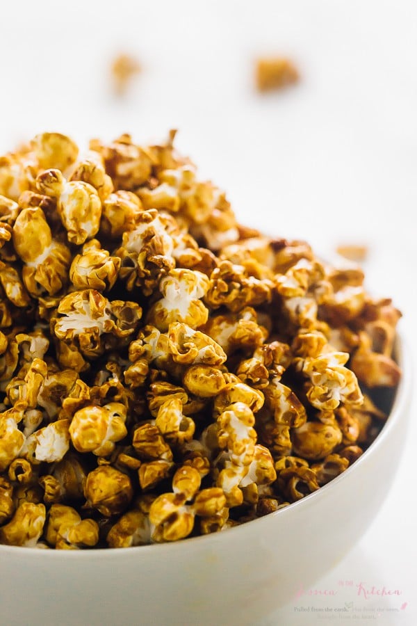 Close up of a full bowl of caramel popcorn