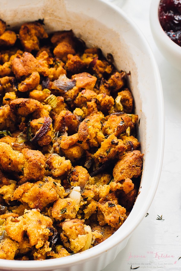 overhead shot of gluten free cornbread stuffing in a white baking dish.