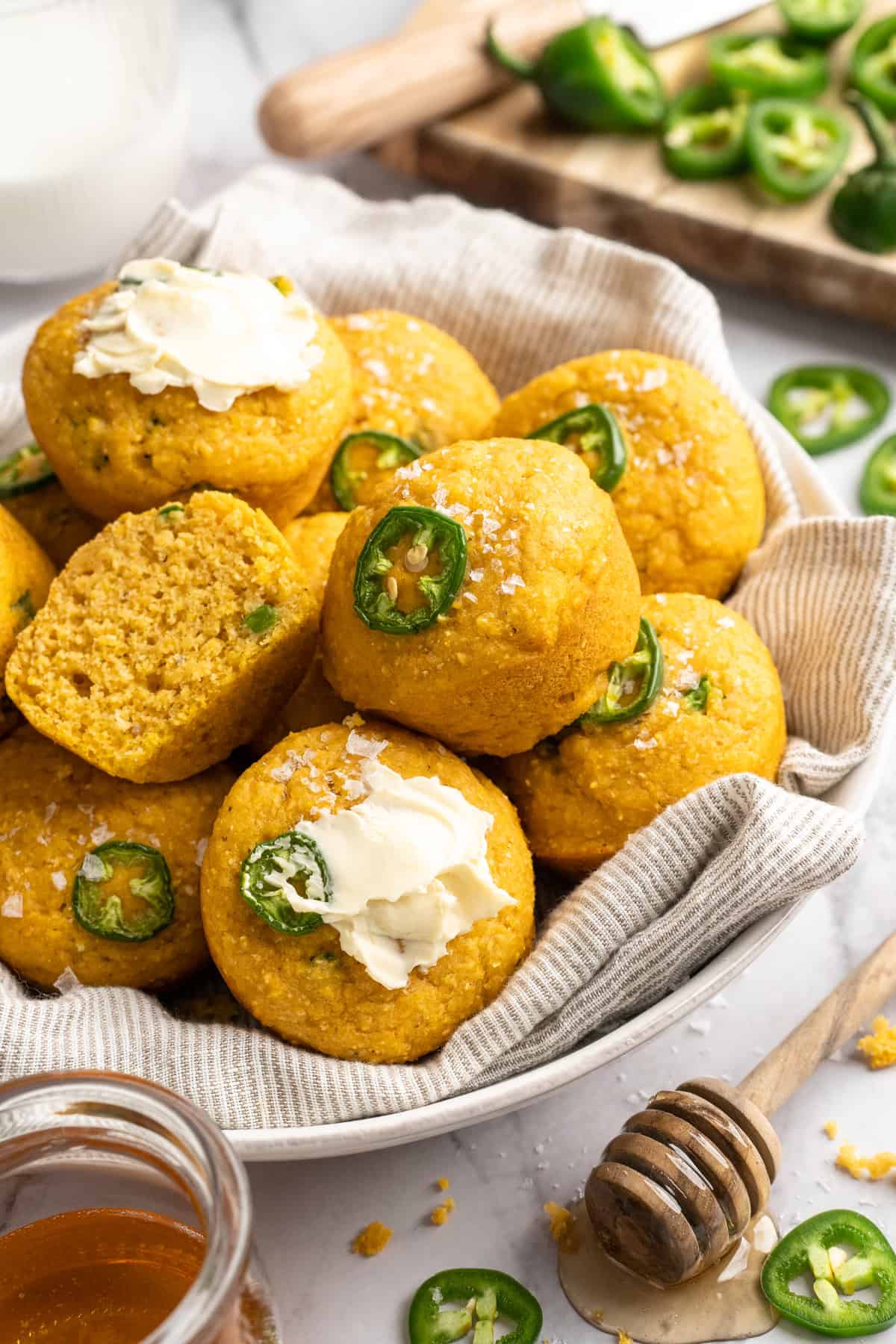These moist vegan jalapeño cornbread muffins are easy to make and have a gluten-free option, which means everyone can enjoy them! Basket of vegan cornbread muffins.